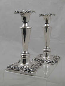 A pair of silver candlesticks