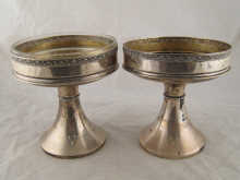 A pair of silver comports one