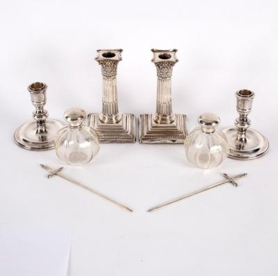 A pair of silver desk candlesticks,