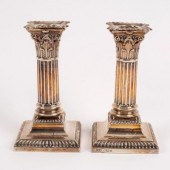 A pair of silver dwarf candles