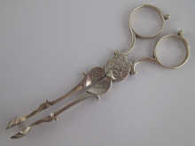 A pair of silver Georgian sugar