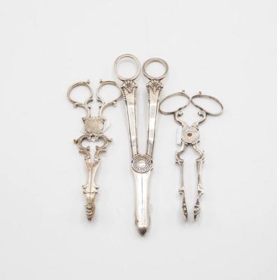 A pair of silver grape scissors,