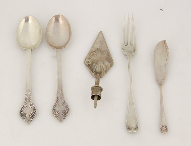 A pair of silver jam spoons