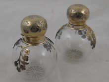A pair of silver mounted scent
