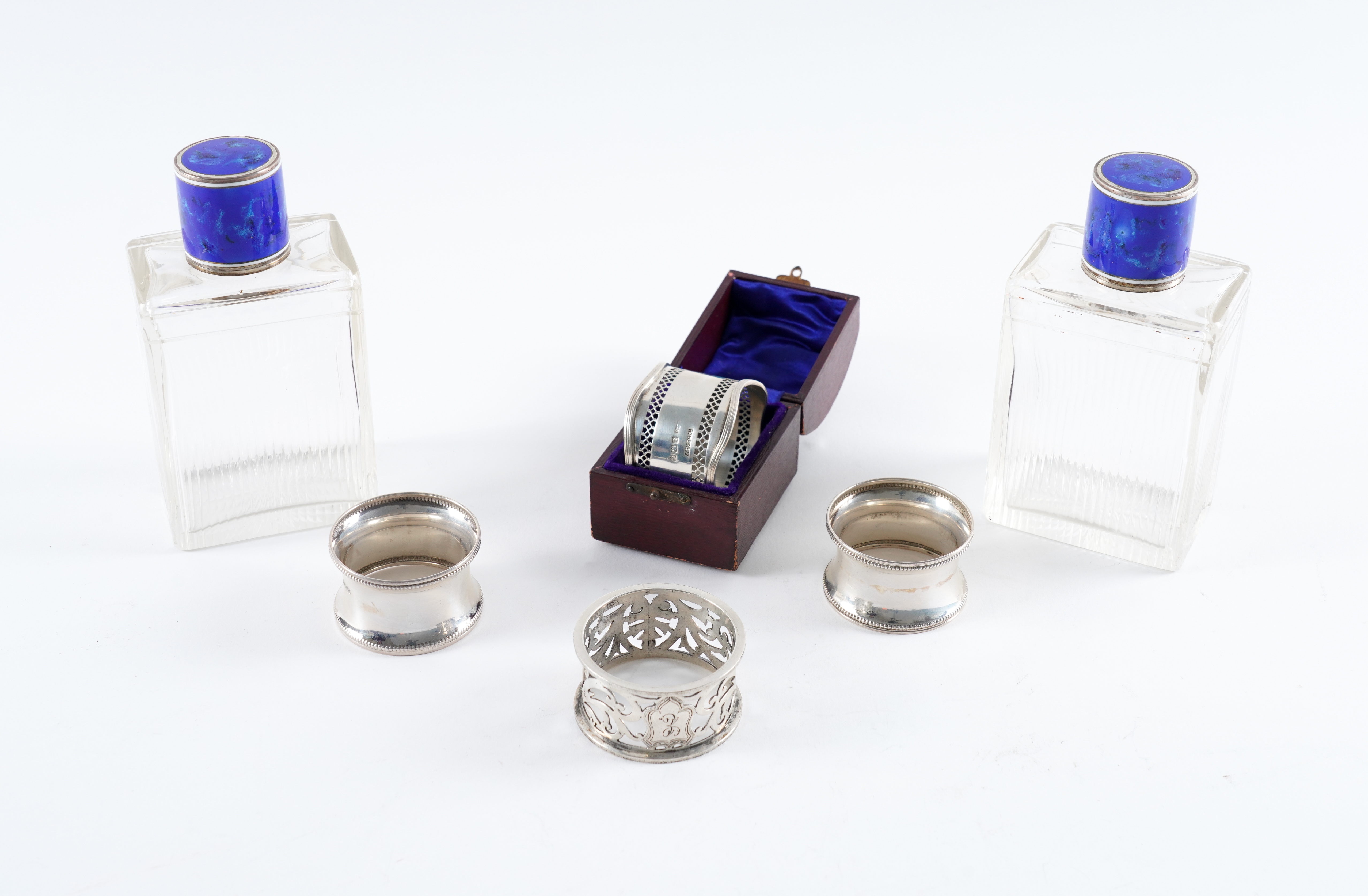 A PAIR OF SILVER NAPKIN RINGS,