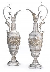 A pair of silver plated garnit