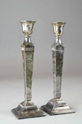 A PAIR OF SILVER PLATED CANDLE