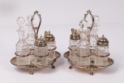 A pair of silver plated cruet