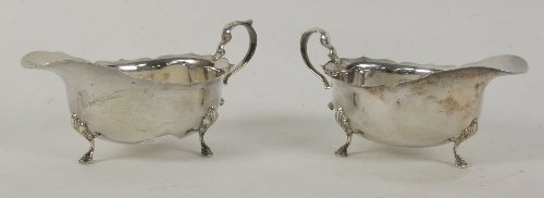 A pair of silver sauce boats