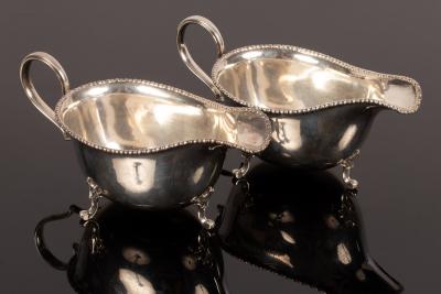 A pair of silver sauce boats, Harry
