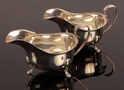 A pair of silver sauce boats,