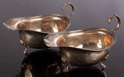 A pair of silver sauce boats,