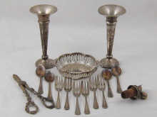A pair of silver specimen vases