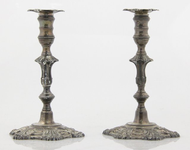 A pair of silver taper sticks