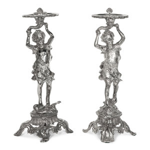 A Pair of Silvered Metal Figures