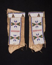 A PAIR OF SIOUX BEADED HIDE WO