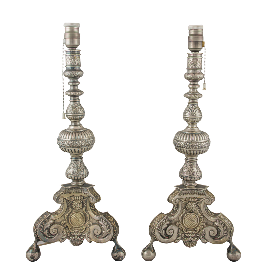 A PAIR OF SPANISH SILVER PRICKET