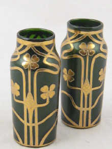 A pair of sparkle green glass vases