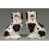 A pair of Staffordshire bone c