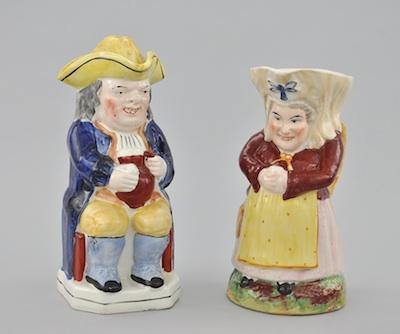 A Pair of Staffordshire Toby Jugs