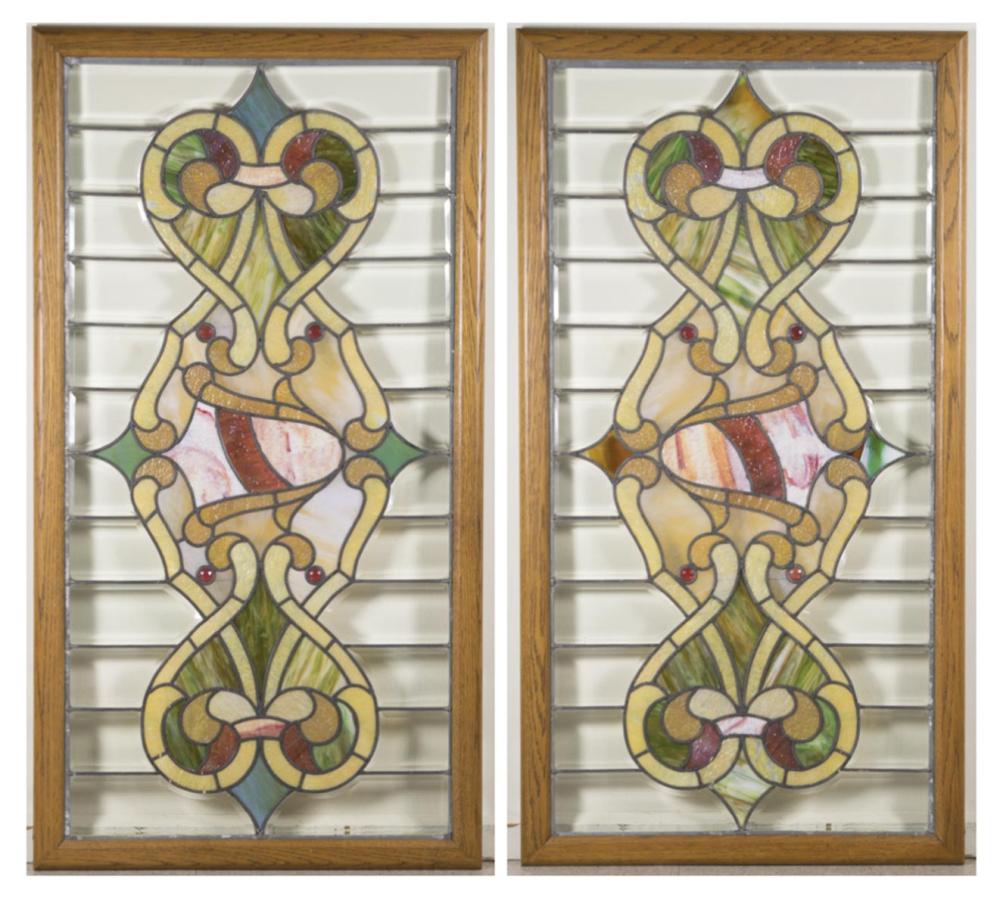 A PAIR OF STAINED, LEADED, AND