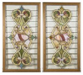 A PAIR OF STAINED, LEADED, AND