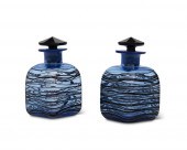 A PAIR OF STEUBEN GLASS DRESSE