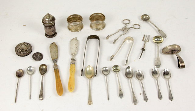 A pair of sugar tongs makers mark