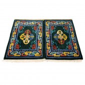 A PAIR OF TIBETAN CARPETS A pa