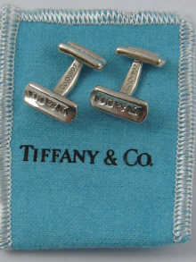 A pair of Tiffany white metal