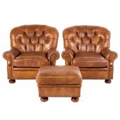 A PAIR OF TUFTED LEATHER ARM C