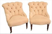 A PAIR OF UPHOLSTERED SLIPPER