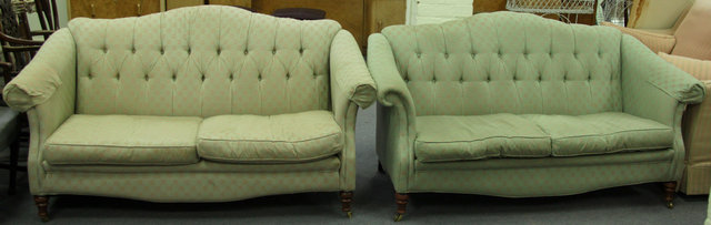 A pair of upholstered sofas with