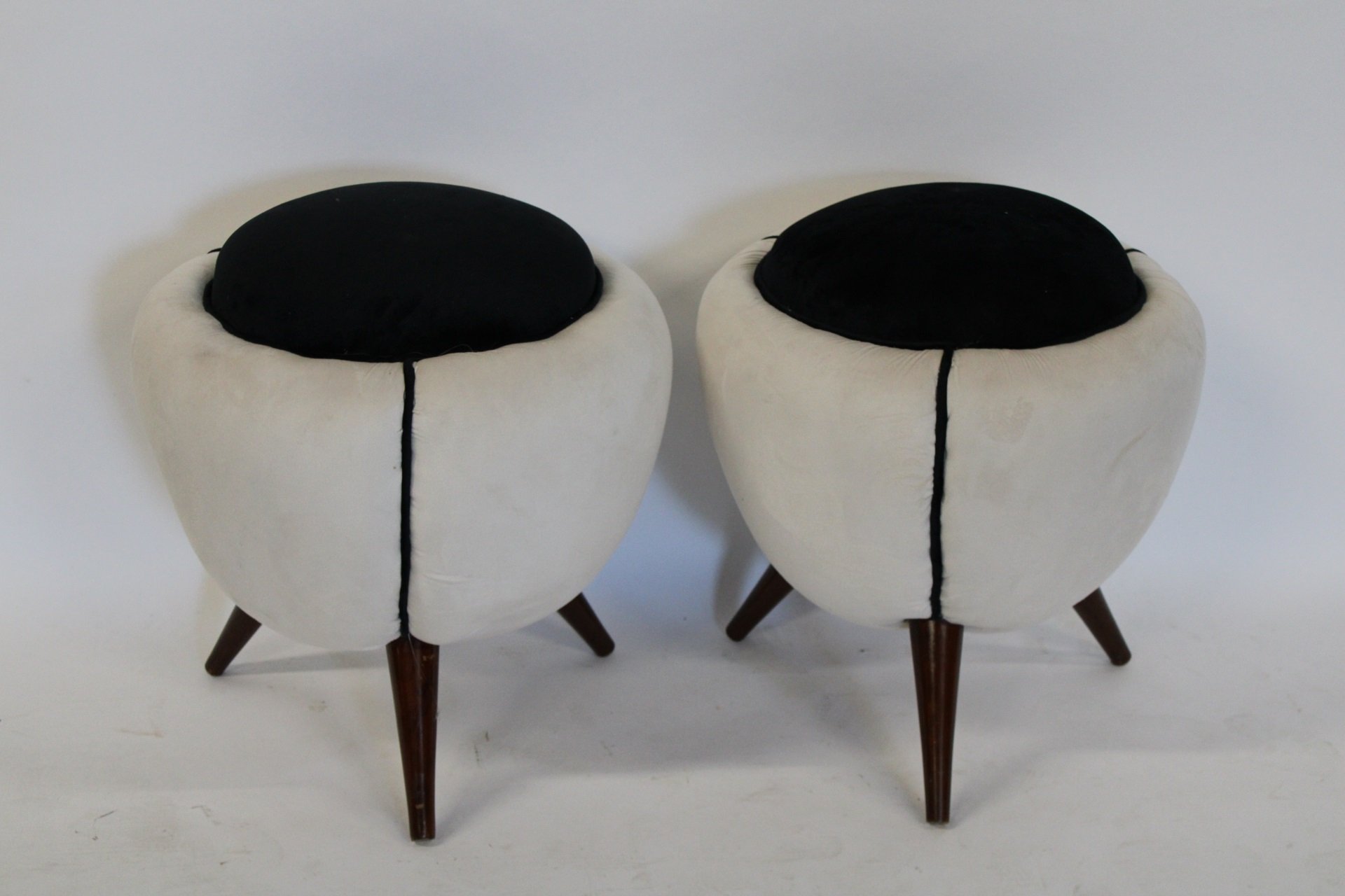 A PAIR OF UPHOLSTERED STOOLS