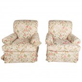 A PAIR OF UPHOLSTERED SWIVEL C