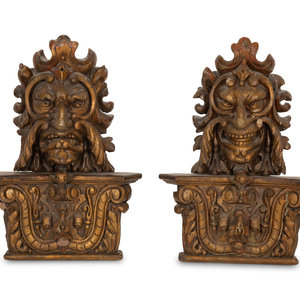 A Pair of Venetian Carved Wood Mask
