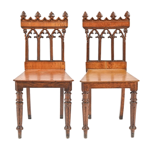 A pair of Victorian gothic oak hall