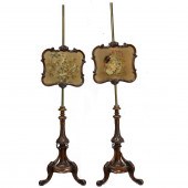 A PAIR OF VICTORIAN WALNUT POL