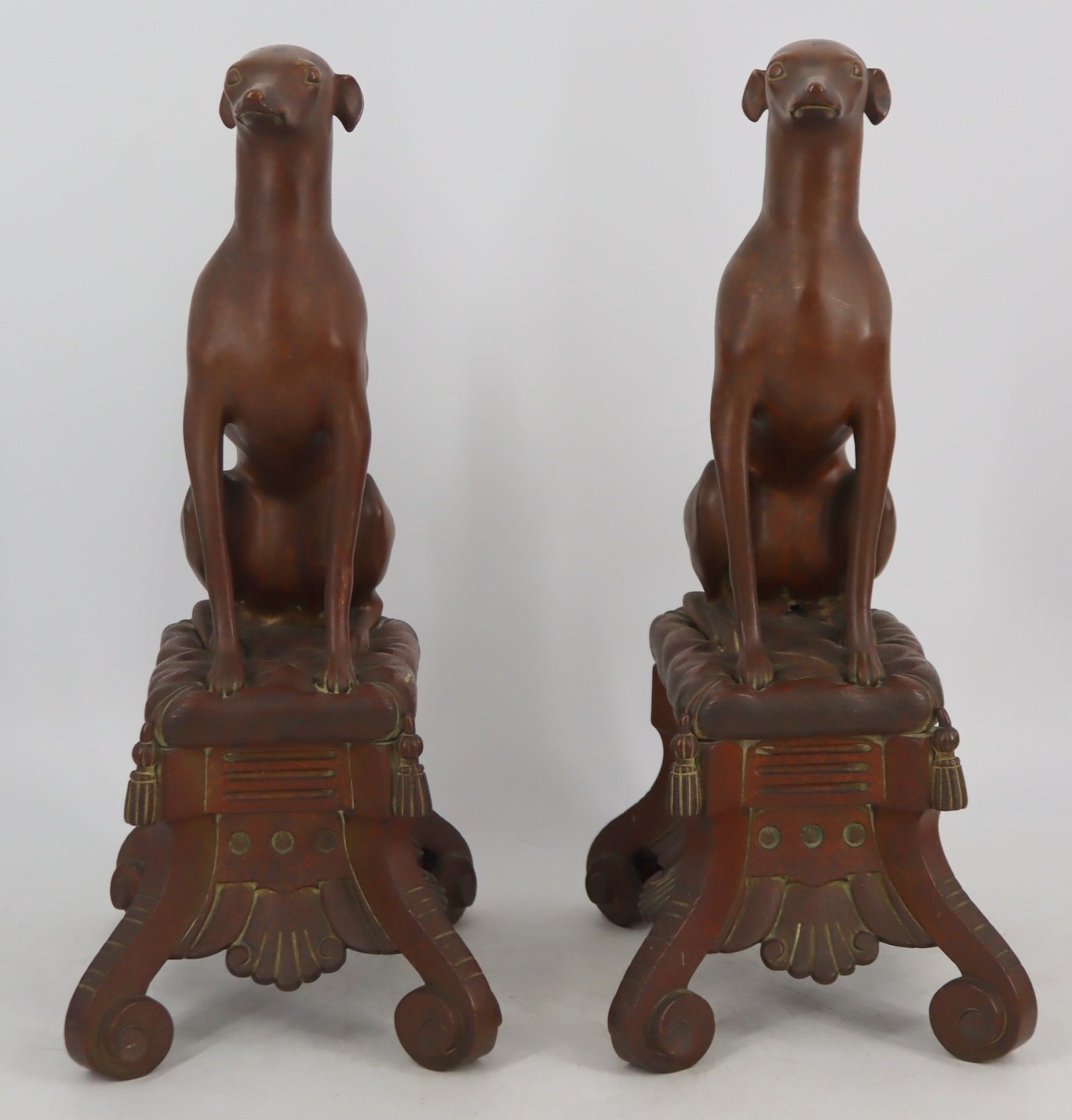 A PAIR OF VINTAGE BRONZE DOG FORM