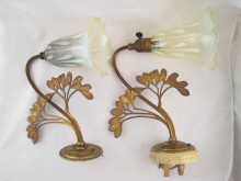 A pair of wall lights circa 1910