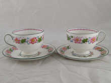 A pair of Wedgwood cups and saucers