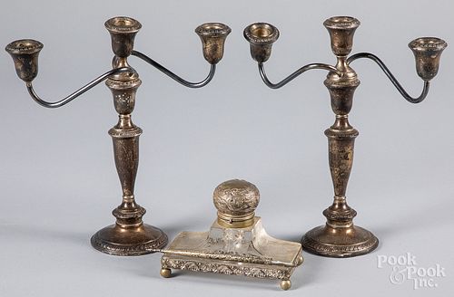 A PAIR OF WEIGHTED STERLING