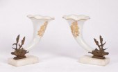 A pair of white glass frill-ri