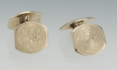 A Pair of White Gold Cufflinks in