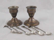 A pair of white metal (tests