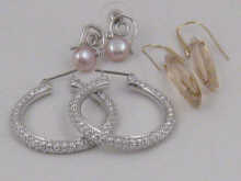A pair of white metal (tests