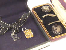 A pair of white metal (tests