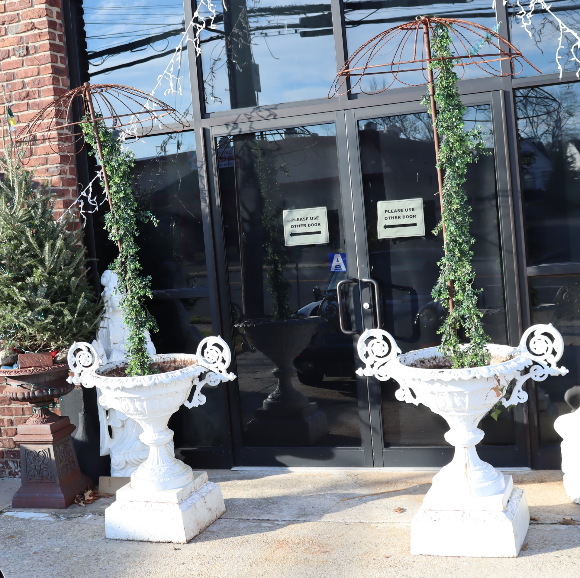 A PAIR OF WHITE PAINTED CAST IRON