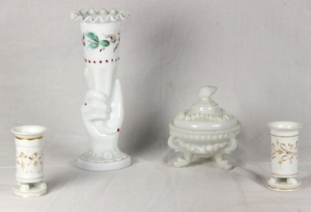 A pair of white porcelain spill
