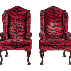 A Pair of Wingback Armchairs with